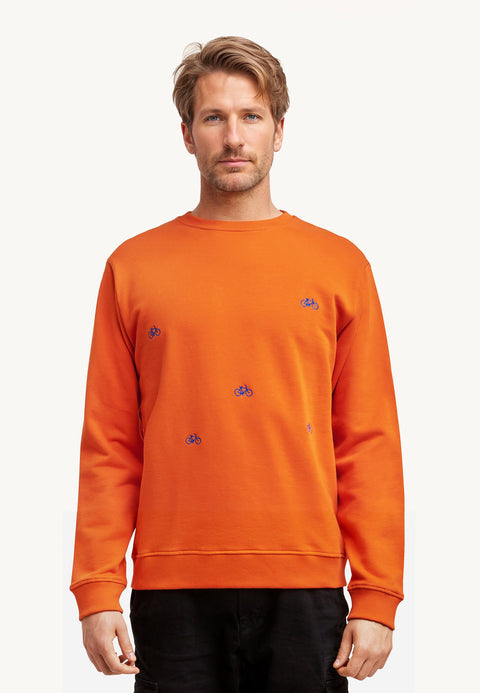 orange sweatshirt with bikes embroidery