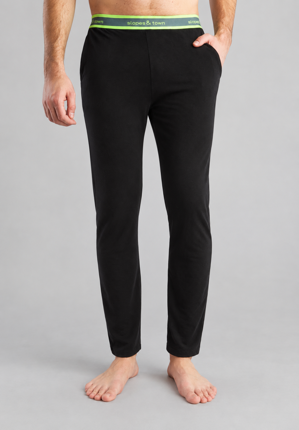 Black bamboo lounge pants, elastic waistband with green trim, full length