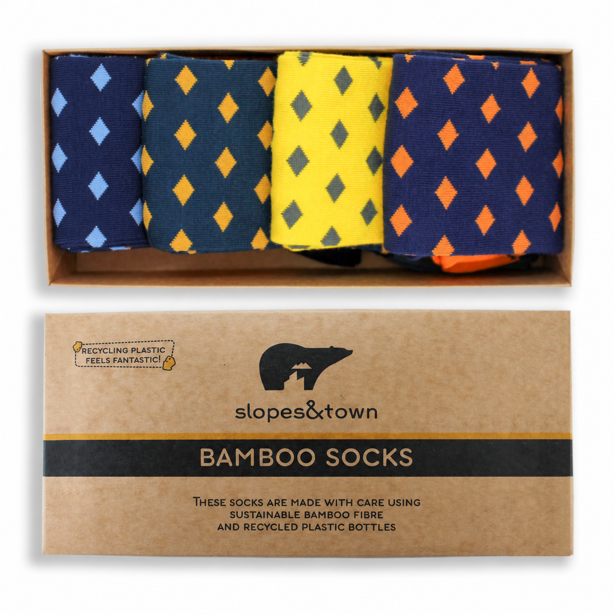 Gift box of four pairs of patterned bamboo socks in navy, yellow, and orange