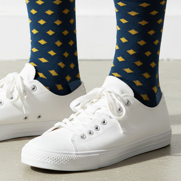 Navy crew socks with mustard geometric diamond pattern